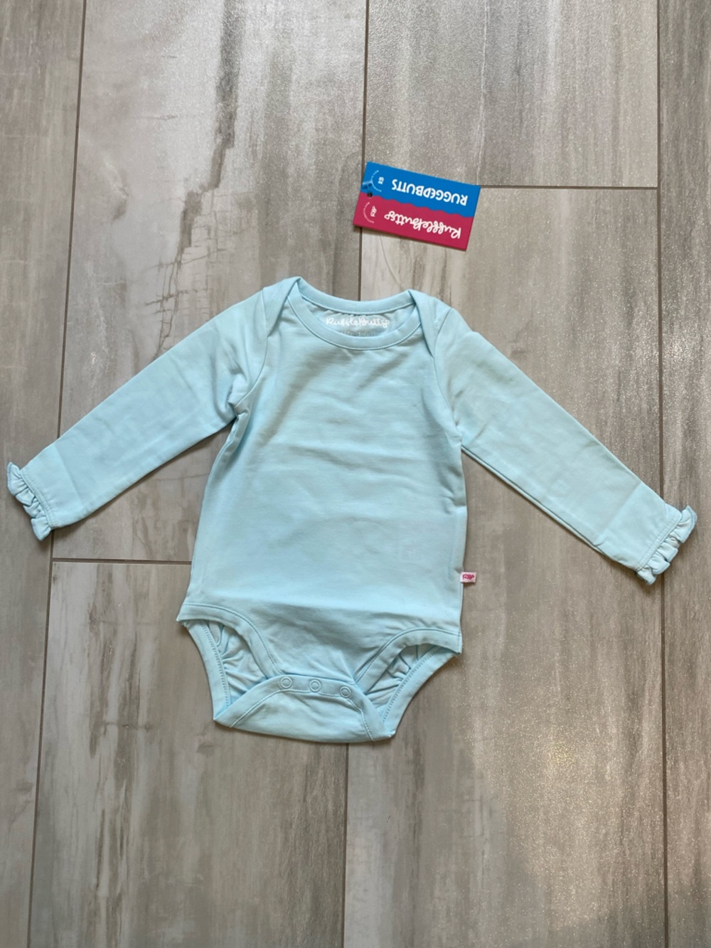 NWT RuffleButts Aqua Ocean Tide Long Sleeve Ruffle Layering Bodysuit girls 3-6M
